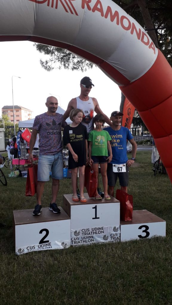 TRIATHLON TEAM PEZZUTTI SUGLI SCUDI AL TRIATHLON SPRINT CITTÀ DI UDINE. "DOPPIETTA" PER CARNELOS E SPADOTTO, PRESENTI ANCHE A SIRMIONE